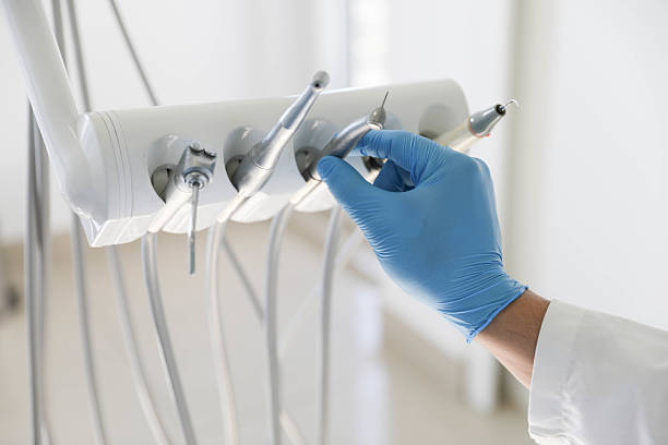 Professional Tooth Extraction technician working in North Palm Beach, FL